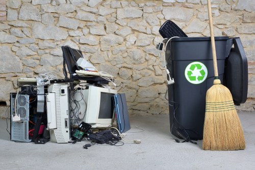 Waste collection truck operating in Central London